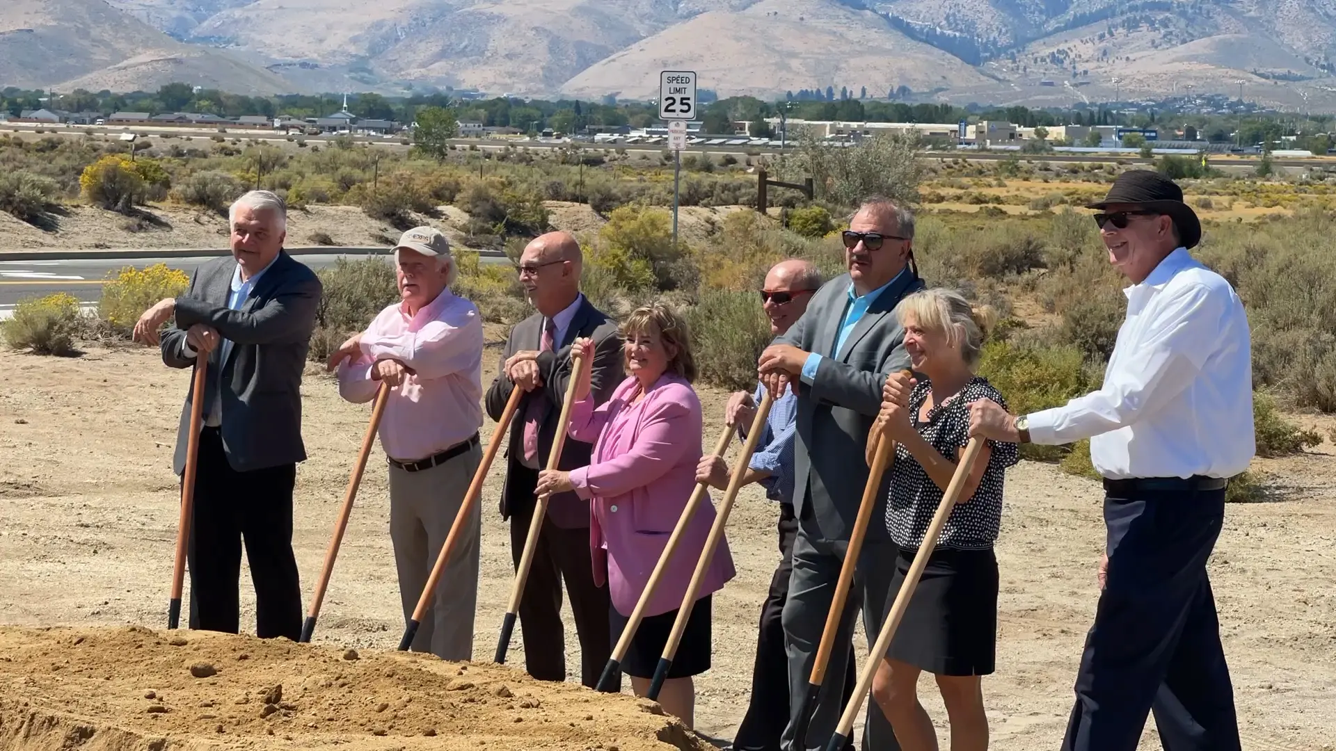 Groundbreaking ceremony for Sierra Flats with community leaders holding shovels